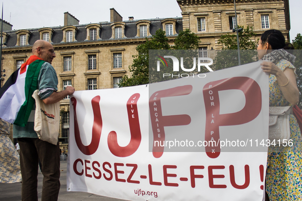 A group is clashing with pro-Israel demonstrators in Republic Square, in City, Country, on Thursday, July 25. The police are trying to keep...