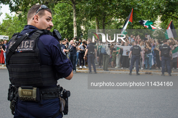 A group is clashing with pro-Israel demonstrators in Republic Square, in City, Country, on Thursday, July 25. The police are trying to keep...