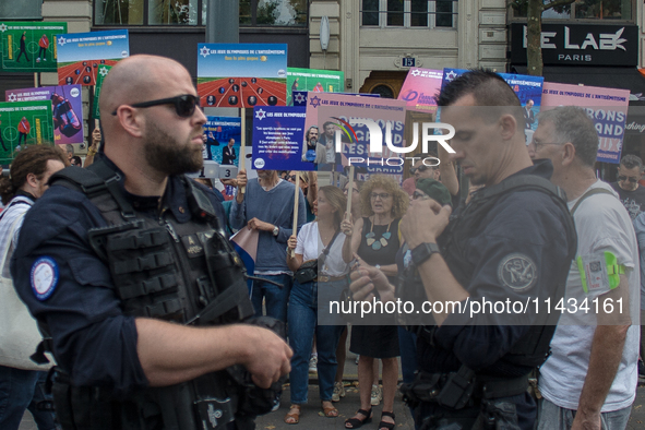 A group is clashing with pro-Israel demonstrators in Republic Square, in City, Country, on Thursday, July 25. The police are trying to keep...