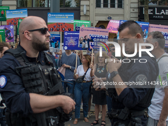 A group is clashing with pro-Israel demonstrators in Republic Square, in City, Country, on Thursday, July 25. The police are trying to keep...