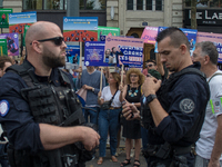 A group is clashing with pro-Israel demonstrators in Republic Square, in City, Country, on Thursday, July 25. The police are trying to keep...