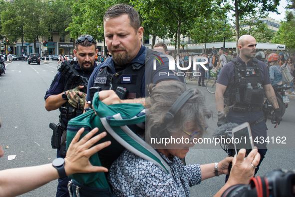 A group is clashing with pro-Israel demonstrators in Republic Square, in City, Country, on Thursday, July 25. The police are trying to keep...