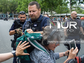 A group is clashing with pro-Israel demonstrators in Republic Square, in City, Country, on Thursday, July 25. The police are trying to keep...