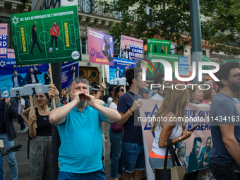 A group is clashing with pro-Israel demonstrators in Republic Square, in City, Country, on Thursday, July 25. The police are trying to keep...