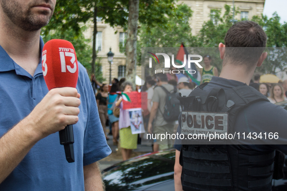 A group is clashing with pro-Israel demonstrators in Republic Square, in City, Country, on Thursday, July 25. The police are trying to keep...