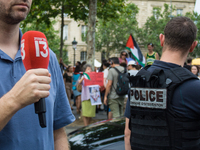 A group is clashing with pro-Israel demonstrators in Republic Square, in City, Country, on Thursday, July 25. The police are trying to keep...