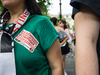 A group is clashing with pro-Israel demonstrators in Republic Square, in City, Country, on Thursday, July 25. The police are trying to keep...