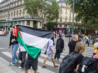 A group is clashing with pro-Israel demonstrators in Republic Square, in City, Country, on Thursday, July 25. The police are trying to keep...