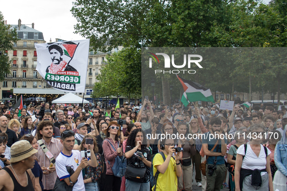 A group is clashing with pro-Israel demonstrators in Republic Square, in City, Country, on Thursday, July 25. The police are trying to keep...