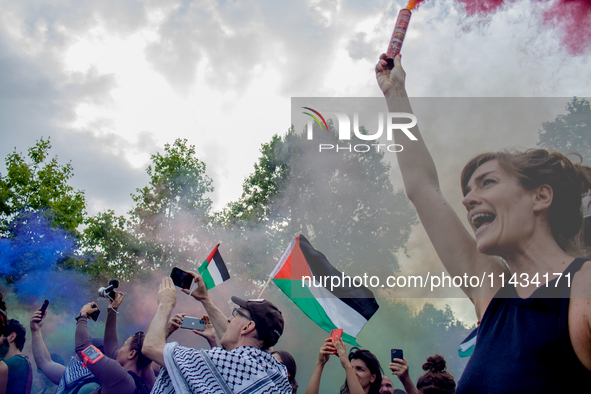 A group is clashing with pro-Israel demonstrators in Republic Square, in City, Country, on Thursday, July 25. The police are trying to keep...