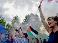 A group is clashing with pro-Israel demonstrators in Republic Square, in City, Country, on Thursday, July 25. The police are trying to keep...