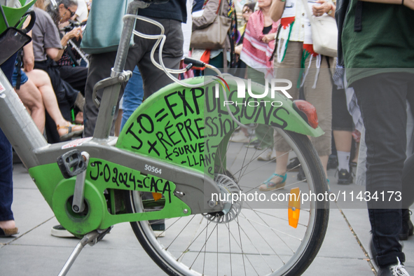 A group is clashing with pro-Israel demonstrators in Republic Square, in City, Country, on Thursday, July 25. The police are trying to keep...