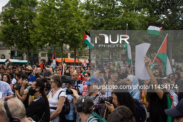 A group is clashing with pro-Israel demonstrators in Republic Square, in City, Country, on Thursday, July 25. The police are trying to keep...