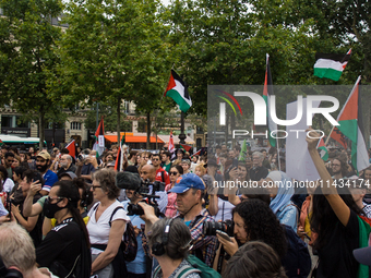 A group is clashing with pro-Israel demonstrators in Republic Square, in City, Country, on Thursday, July 25. The police are trying to keep...