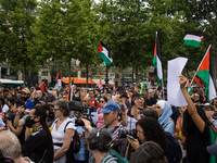 A group is clashing with pro-Israel demonstrators in Republic Square, in City, Country, on Thursday, July 25. The police are trying to keep...