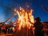 People are celebrating the Torch Festival at Torch Square in Butuo county, Liangshan Yi autonomous prefecture, in Sichuan, China, on July 22...