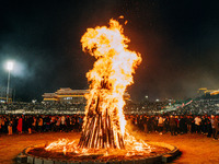 People are celebrating the Torch Festival at Torch Square in Butuo county, Liangshan Yi autonomous prefecture, in Sichuan, China, on July 22...