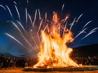 People are celebrating the Torch Festival at Torch Square in Butuo county, Liangshan Yi autonomous prefecture, in Sichuan, China, on July 22...