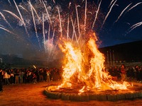 People are celebrating the Torch Festival at Torch Square in Butuo county, Liangshan Yi autonomous prefecture, in Sichuan, China, on July 22...