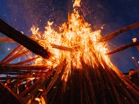 People are celebrating the Torch Festival at Torch Square in Butuo county, Liangshan Yi autonomous prefecture, in Sichuan, China, on July 22...