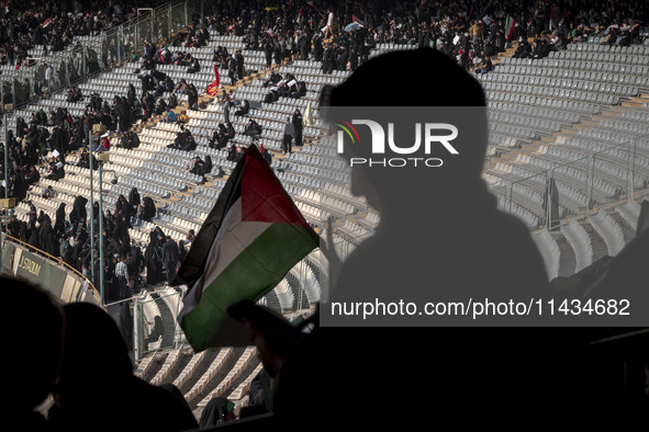 Veiled Iranian women are participating in a family rally to support mandatory hijab at the Azadi (Freedom) Stadium in western Tehran, Iran,...