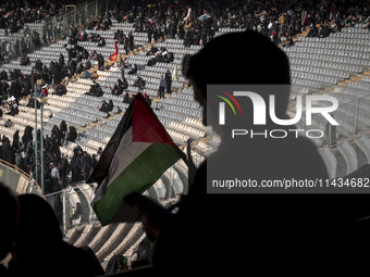 Veiled Iranian women are participating in a family rally to support mandatory hijab at the Azadi (Freedom) Stadium in western Tehran, Iran,...