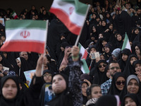 Veiled Iranian women and their families are participating in a family rally to support mandatory hijab at the Azadi (Freedom) Stadium in wes...