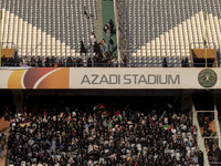 Veiled Iranian women and their families are participating in a family rally to support mandatory hijab at the Azadi (Freedom) Stadium in wes...