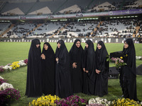 A group of veiled clergywomen are performing in a family rally to support mandatory hijab at the Azadi (Freedom) Stadium in western Tehran,...