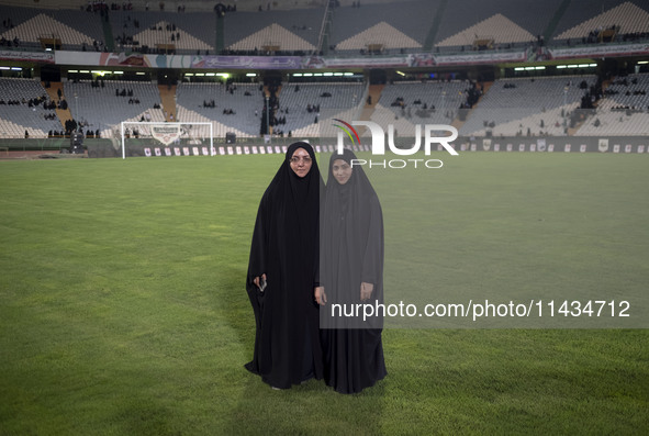 Two veiled clergywomen from Thailand and Azerbaijan, who are living and studying at the Jamiat al-Zahra International seminary school in the...