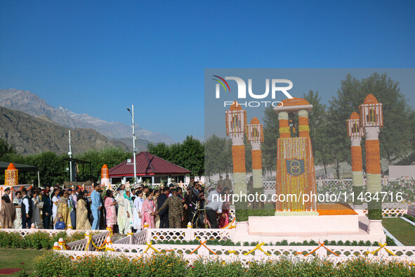 People are arriving to pay tribute at the war memorial during the ''Vijay Diwas'' or Victory Day celebration in Drass, about 160 km (99 mile...