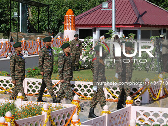 Indian Army Chief Upendra Dwivedi is arriving to pay tribute at a war memorial during the ''Vijay Diwas'' or Victory Day celebration in Dras...