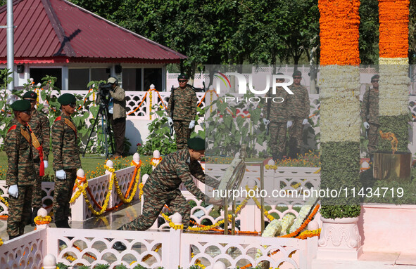 Indian Army Chief Upendra Dwivedi is laying a wreath at a war memorial during the ''Vijay Diwas'' or Victory Day celebration in Drass, about...