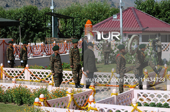 Indian Prime Minister Narendra Modi is arriving to pay tribute at a war memorial during the ''Vijay Diwas'' or Victory Day celebration in Dr...