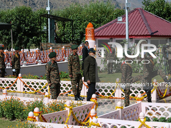 Indian Prime Minister Narendra Modi is arriving to pay tribute at a war memorial during the ''Vijay Diwas'' or Victory Day celebration in Dr...