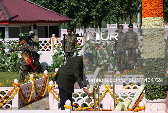 Indian Prime Minister Narendra Modi is laying a wreath at a war memorial during the ''Vijay Diwas'' or Victory Day celebration in Drass, abo...