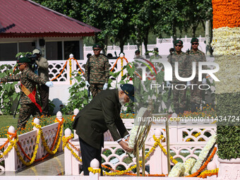 Indian Prime Minister Narendra Modi is laying a wreath at a war memorial during the ''Vijay Diwas'' or Victory Day celebration in Drass, abo...