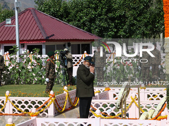 Indian Prime Minister Narendra Modi is paying tribute at a war memorial during the ''Vijay Diwas'' or Victory Day celebration in Drass, 160...