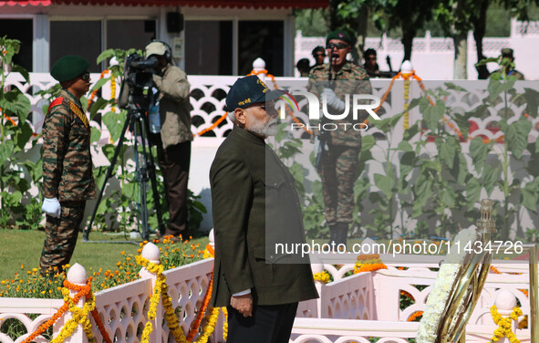 Indian Prime Minister Narendra Modi is paying tribute at a war memorial during the ''Vijay Diwas'' or Victory Day celebration in Drass, 160...