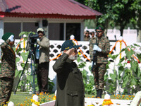 Indian Prime Minister Narendra Modi is saluting as he pays tribute at a war memorial during the ''Vijay Diwas'' or Victory Day celebration i...