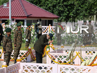 Indian Prime Minister Narendra Modi is paying tribute at a war memorial during the ''Vijay Diwas'' or Victory Day celebration in Drass, 160...