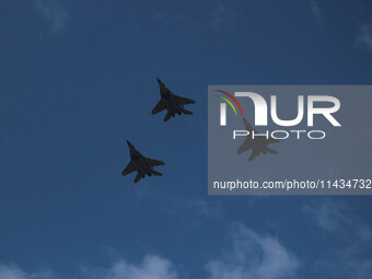 Indian Air Force fighter jets are performing during the ''Vijay Diwas'' or Victory Day celebration in Drass, 160 km (99 miles) east of Srina...