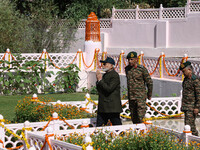 Indian Prime Minister Narendra Modi (C) and senior Army officers are being seen at a war memorial during the ''Vijay Diwas'' or Victory Day...