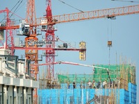 Tower cranes are being seen at a real estate construction site in Yantai, Shandong province, China, on July 23, 2024. On July 15, 2024, the...