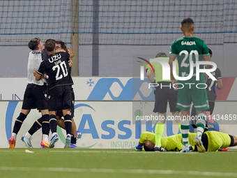 Silva Joao Pedro Ferreira (3rd L, partially hidden) of Vitoria SC is being congratulated by his teammates after scoring the 0-1 goal during...