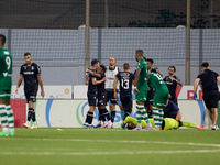 Silva Joao Pedro Ferreira (2nd R) of Vitoria SC is being congratulated by his teammates after scoring the 0-1 goal during the UEFA Europa Co...