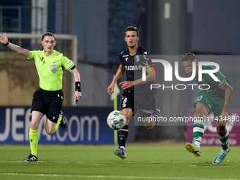 Matias Garcia of Floriana is being closely followed by Tomas Handel of Vitoria SC during the UEFA Europa Conference League, Second Qualifyin...