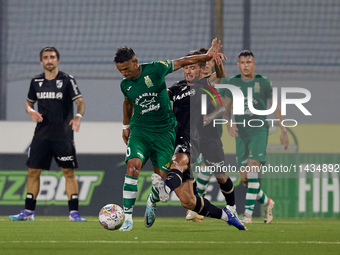 Matias Garcia (front left) of Floriana is being closely challenged by Tomas Handel (front right) of Vitoria SC during the UEFA Europa Confer...