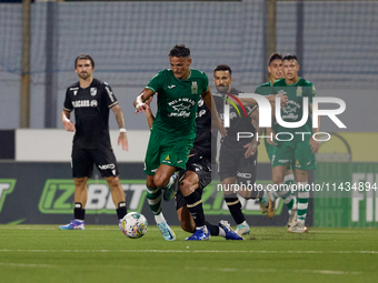 Matias Garcia (front left) of Floriana is being closely challenged by Tomas Handel (front right, partially hidden) of Vitoria SC during the...