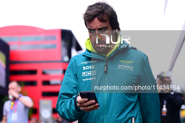 Fernando Alonso of Aston Martin Cognizant F1 Team is arriving in the paddock after the race of the Belgian GP, the 14th race of the Formula...